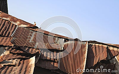 Damage rusty roof of the factory Stock Photo