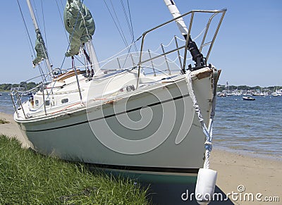 Damage on sailboat washed ashore on Nantucket by Hurricane Editorial Stock Photo