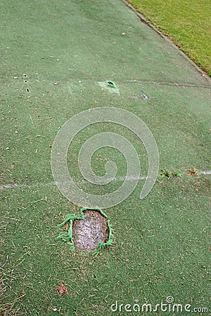 Damaged artificial cricket wicket Stock Photo