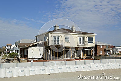 Damaged beach house in devastated area one year after Hurricane Sandy Editorial Stock Photo