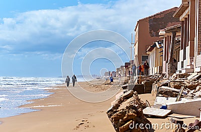 Damaged beach houses. Spain Editorial Stock Photo