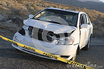 Damaged Car Behind Warning Tape Stock Photo