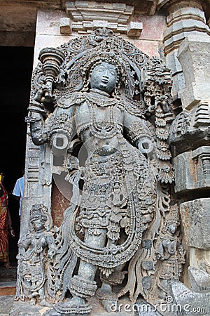 Damaged or Destroyed Sculpture of Dvarapala door or gate guardian at the entrance of Hoysaleswara Temple Editorial Stock Photo