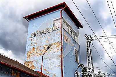 Damaged facade of old building of train station in city Ruzomberok at Slovakia Editorial Stock Photo