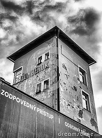 Damaged facade of old building of train station in city Ruzomberok at Slovakia Editorial Stock Photo