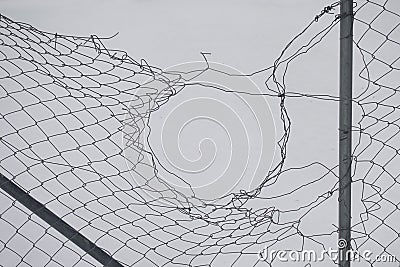 Damaged fence abstract wire shapes Stock Photo