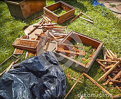 damaged hives and honey frames Stock Photo