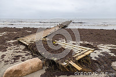 Damaged pier after flood storm in Vallensbaek Denmark 20 October 2023 Koge bugt, Stock Photo