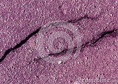 Damaged purple toned asphalt surface. Stock Photo