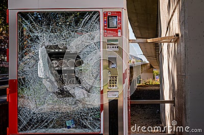 Damaged Selecta vending machine. Broken glass. Violence concept Editorial Stock Photo