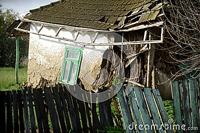 Damaged traditional adobe house Stock Photo