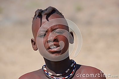 Damaraland, Namibia - August 2016: Face of an Himba Girl Editorial Stock Photo