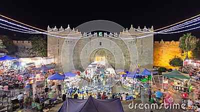 Damascus Gate entrance timelapse Old City Jerusalem Palestine Israel night light long exposure motion blur Editorial Stock Photo