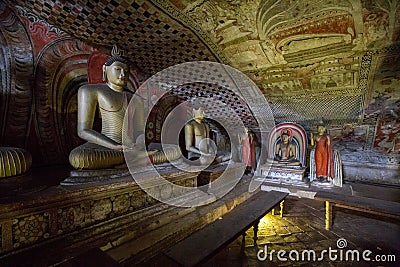 Buddha statues inside Dambulla Cave Temple, Sri Lanka Editorial Stock Photo