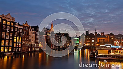 The Damrak channel, Amsterdam Editorial Stock Photo