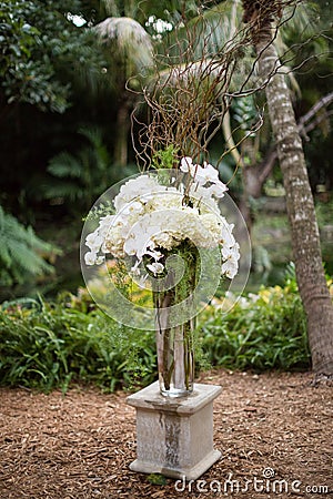 Flower arrangement on plinth Stock Photo