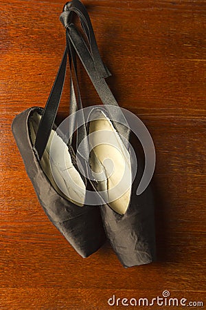 Dance Ballet Pointes Shoes on Old Vintage Background Stock Photo