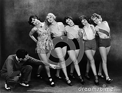 Dance instructor instructing five young women Stock Photo