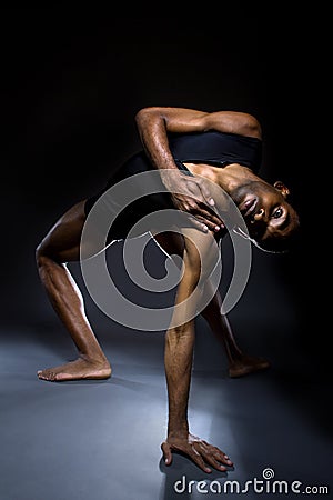 Dancer Demonstrating Flexibility Stock Photo