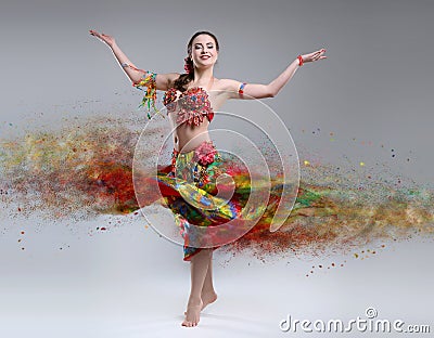 Dancer with disintegrating dress. Stock Photo