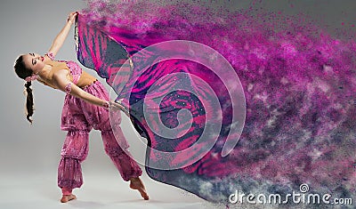 Dancer with disintegrating scarf. Stock Photo
