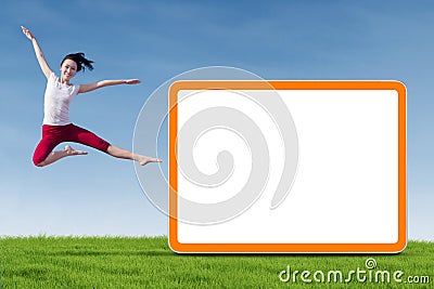 Dancer woman jumping with empty board Stock Photo
