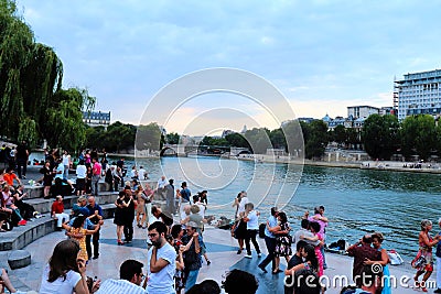 Dancers along the Seine in Paris Editorial Stock Photo