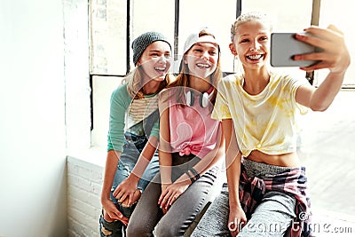 The dancers selfie. young girls taking a selfie in a dancing studio. Stock Photo