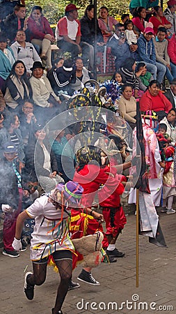 Dancers and spectators at the Diablada Editorial Stock Photo