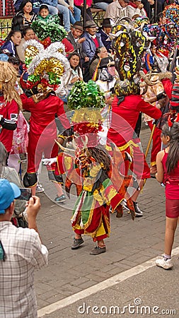 Dancers and spectators at the Diablada Editorial Stock Photo