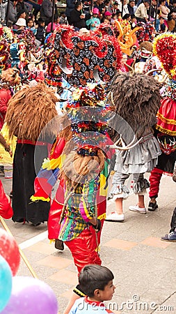 Dancers and spectators at the Diablada Editorial Stock Photo