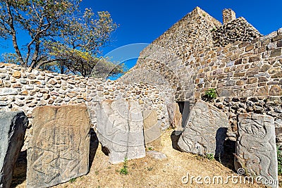 Dancers and Temple in Monte Alban Stock Photo