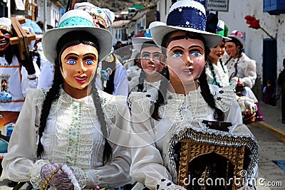 Dancing devotees with mask in the streets of the town the procession of the Virgin of Carmen -.Catholic religion Editorial Stock Photo