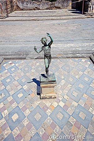 Dancing Faun statuette in Pompeii Stock Photo