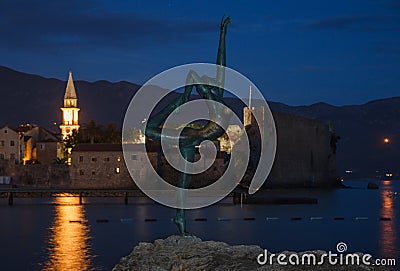 Dancing Girl Statue at sunset, blue hours and night. Montenegro. Adriatic sea. Editorial Stock Photo
