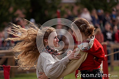 Dancing girls in medieval clothes Editorial Stock Photo