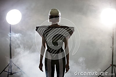 Dancing girls in a smoke on a white background Stock Photo