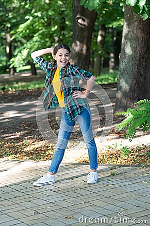 Dancing hiphop.Happy adolescent girl dancer dancing outdoors, dancing Stock Photo