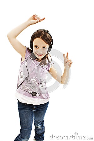 Dancing little girl headphones music Stock Photo