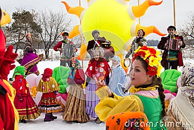 Dancing and singing people during Maslenitsa celebration. Russia. Editorial Stock Photo