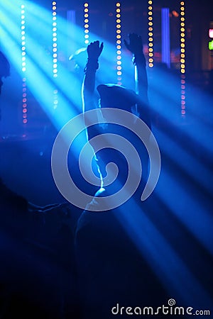 Dancing woman in nightclub Stock Photo