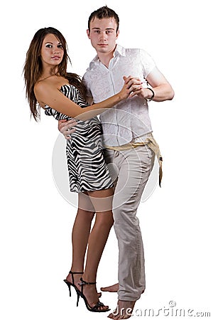 The dancing young beauty couple Stock Photo