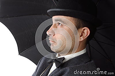 Dandy man with umbrella Stock Photo