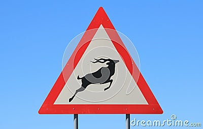 Danger - Kudu and Wildlife Crossing Road Sign - Road Hogs watch out for the pigs Stock Photo