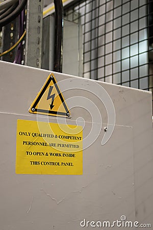 Danger symbol industrial sign with warning symbo for electrocution electricity on control panel casing Editorial Stock Photo