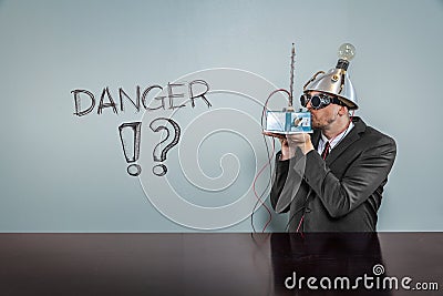 Danger text with vintage businessman Stock Photo