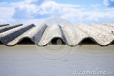 Dangerous asbestos roof panels - one of the most dangerous materials in the construction industry Stock Photo