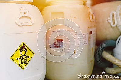 Dangerous chemical Oxidizing agent UN2468 Trichloroisocyanuric acid or Chlorine tank for pool disinfectant Stock Photo