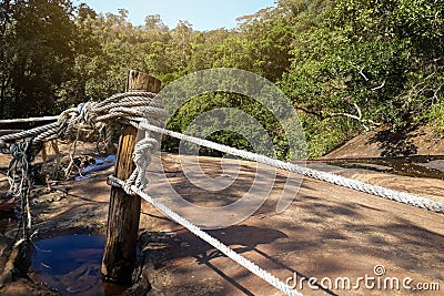 Dangerous Cliff. Rope separating the steep cliff Stock Photo