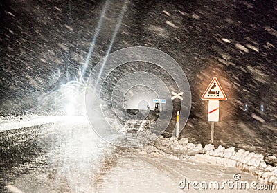 Dangerous driving in winter night Stock Photo